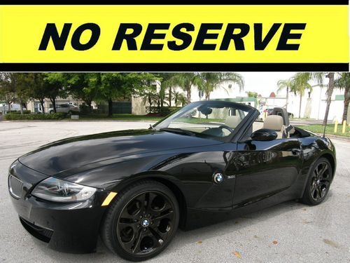 2006 bmw z4 convertible,heated leather,18inch rims,new power top,under warranty