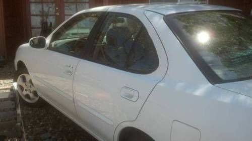 2005 nissan sentra s sedan 4-door 1.8l white used low miles