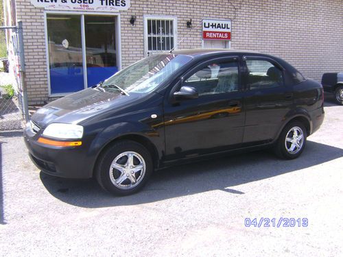 2005 chevrolet aveo ls sedan 4-door 1.6l low miles 5 speed manual great mpg