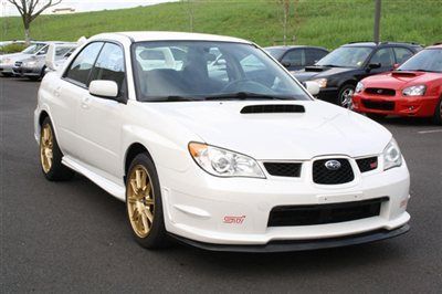 2007 subaru impreza wrx sti. white on gold. clean condition.