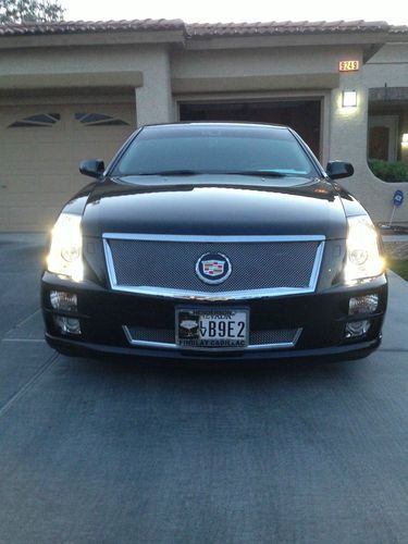 Certified pre-owned until oct. 2015 - low miles - cadillac sts - black on black