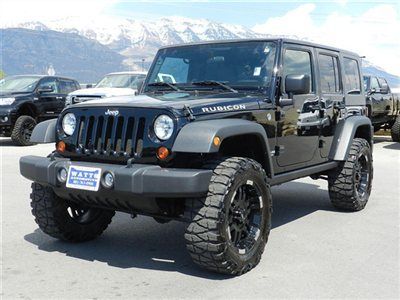 Unlimited rubicon 4x4 4 door hardtop custom lift wheels tires auto nav low miles