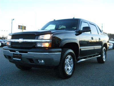 We finance! lt z71 4x4 lift kit leather roof nav bose serviced carfax certified