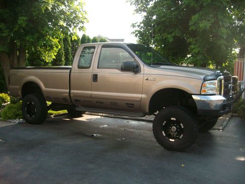 2003 ford f250 super duty xtra cab extended cab 8ft bed 5.4l 79k lift 35" tires