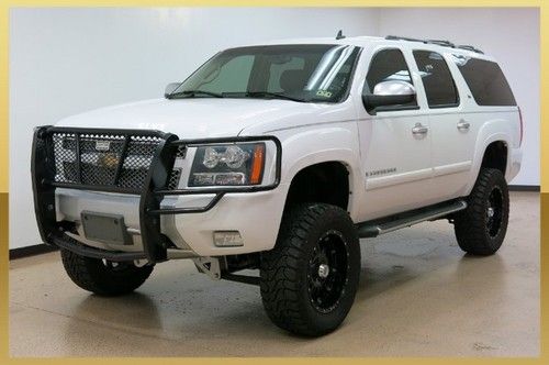 Lt, sunroof, leather, 3rd row, custom lift, xd rims, btooth, navi