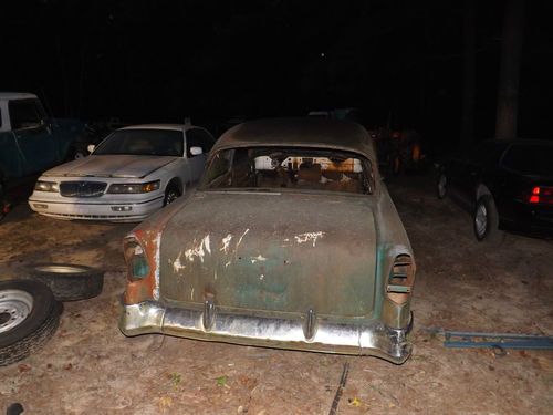 56 chevy belair  2 door hard top condition fair dark greenvery lil rust in floor