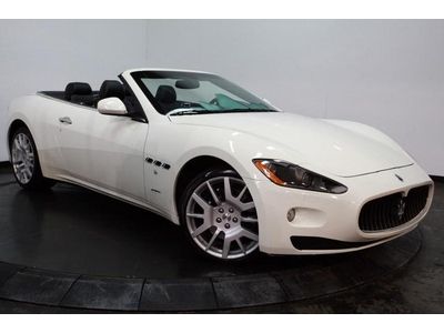 Convertible, 20 inch factory wheels, white on black leather, bose premium sound