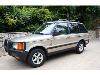 White gold exterior clean carfax converted to spring suspension drives great!!
