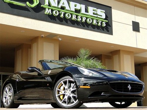 Scuderia shields, yellow brake calipers, carbon ceramic brakes, yellow rev count