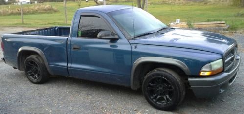 2002 dodge dakota lowered 5 speed fast great on gas! custom adult owned