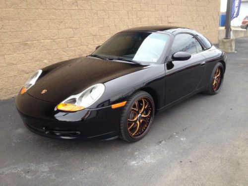 Black 1999 porsche 911 carrera convertible  only 40,297 miles