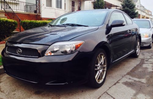 2005 scion tc, two door hatchback, manual, black inside/out