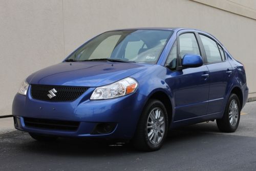 Envy-automotive.com 2013 suzuki sx4 le automatic 4 cylinder gas saver only 45k