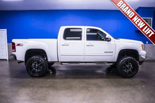Lifted low miles crew cab bed liner nerf bars sunroof leather pwr locks &amp; window