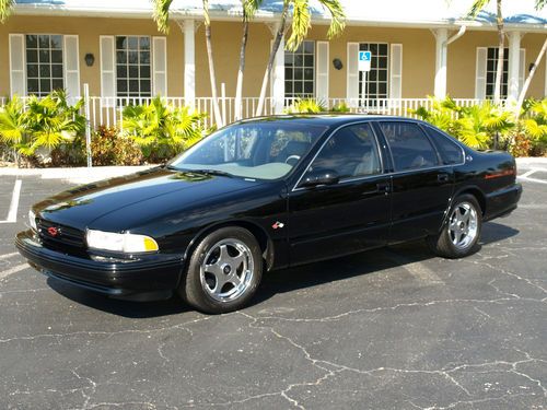 Black ss low miles florida car upgrades factory chrome wheels