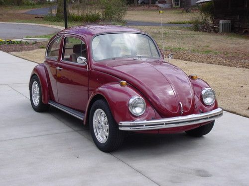 Restored beetle with empi wheels, sew fine seats and new gauges &amp; headliner.