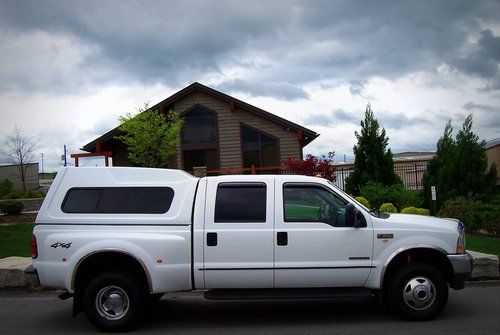 Lariat 4x4 dually crew glass top super clean and nice truck ready to roll