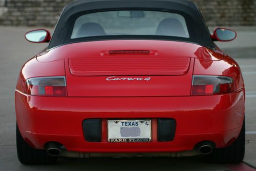 Red cabriolet, all-wheel drive, 6 speed manual.