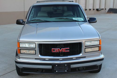 1999 gmc yukon slt.....2 owner suv.....loaded......4x4....tow package......tahoe