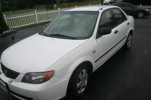 2003 mazda protege dx sedan 4-door 2.0l,  91,406 miles, md inspected.