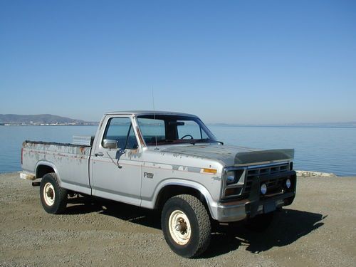 1985 ford f250hd 4x4 4spd 460 non cat model posi ac 140k original owner, extras.