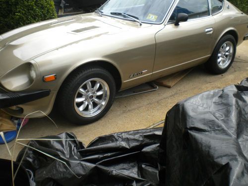 1978 datsun 280z gold with ghost frames origidal engine low miles always garaged