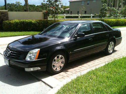 Cadillac dts luxury sedan black runs looks great south florida car