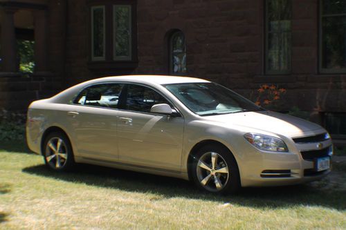 Lt sedan 4-door 2.4l gold w/ beige interior clean - safe - reliable used car