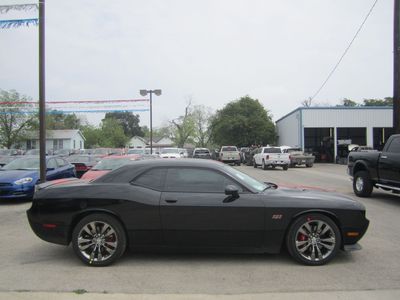 Brand new sleek black 2013 dodge challenger srt8 coupe with red racing stripes