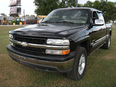 L@@k in texas 2002 chevrolet 1500 extended cab 4x4 selling to highest bidder!