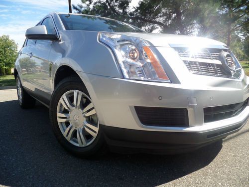 2012 cadillac srx awd/ no reserve/ navigation/ back up camera/ panoroof/ leather