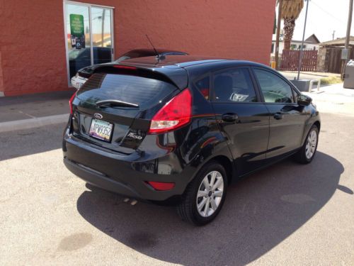 2011 ford fiesta se hatchback 4-door 1.6l - 38 mpg!!!