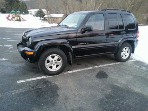 Black 2003 jeep liberty limited, 4wd, good condition,newer engine and trans.