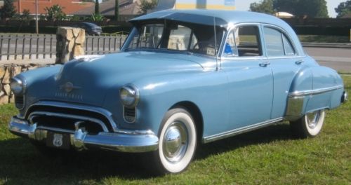 1949 oldsmobile 88 sedan, skirts, visor, wide white wall tires, a real survivor