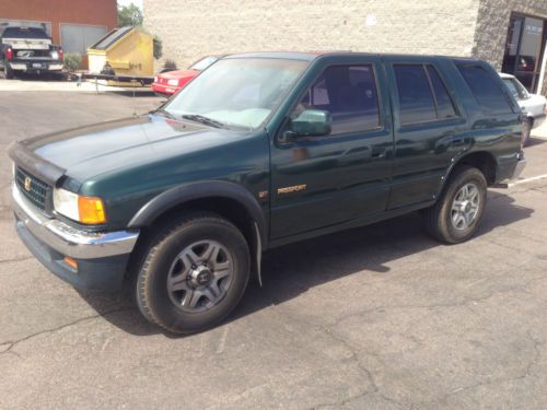 1997 honda passport 4x4, needs engine work, has cold a/c, off road? no reserve