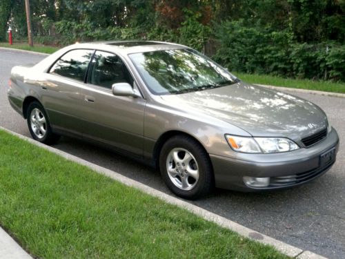 No reserve! low miles, 2nd owner with clean carfax, leather, sunroof, cd changer