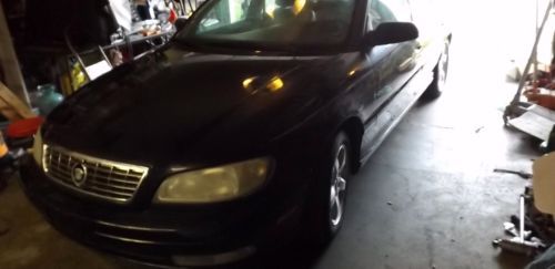 2000 black cadillac catera tan interior v6 129,000 miles