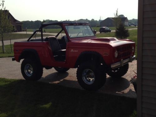 Red, excellent condition, u15, v8, 302, fiberglass hood scoop and door inserts