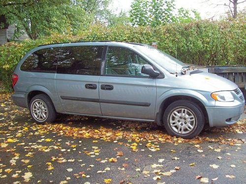 2005 gray dodge grand caravan with wheel chair assist.
