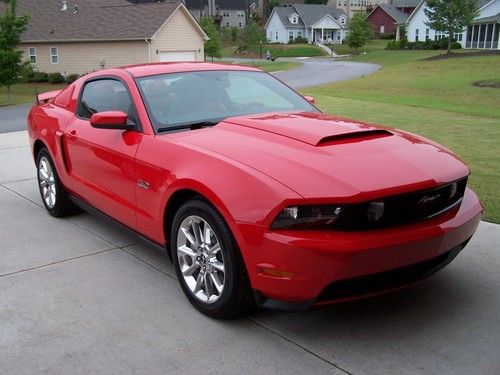 850 miles, race red premiium gt, rare red interior, showroom new