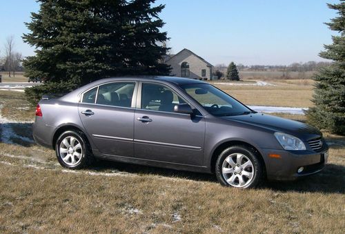 2008 kia optima ex sedan 4-door 2.4l leather seats,exc.condition,garage kept