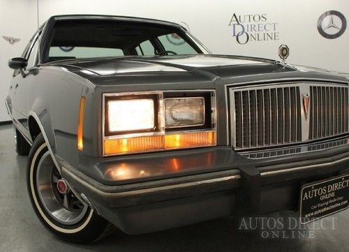 We finance 1985 pontiac bonneville brougham 61k pwrst clean carfax pwrlckswndws