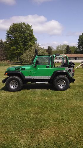 1999 jeep wrangler sport 4.0l 6cyl new top,tires33's,body lift 4 in,clean frame