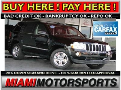 We finance '07 jeep suv hemi navigation, backup camera, sunroof, dvd, premium