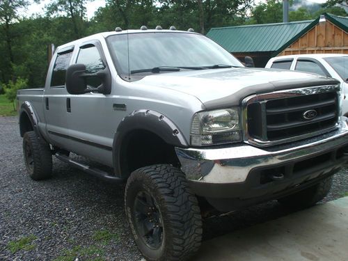 04 lifted f-250 4x4 4 door customized