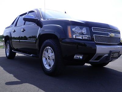 Black with black leather bose audio power moonroof 18" z71 wheels remote start