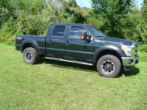 2012 sd f350 4x4 crew cab lariat 6.2 liter v-8 w/ 6 speed auto trans 8,000 miles