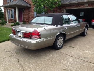 This is mercury's fanciest car ever, the signature series, with black vinyl top.