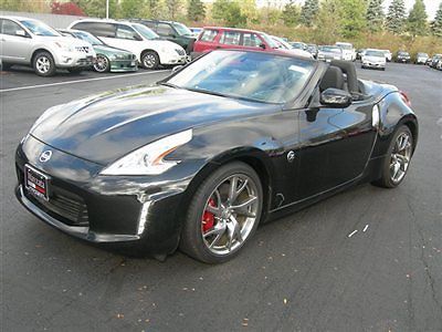 Pre-owned 2013 370z roadster touring and sport, 6 speed, nav, only 2075 miles