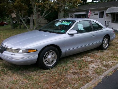 Beautiful silver 2 door hardtop , with all gray leather interior